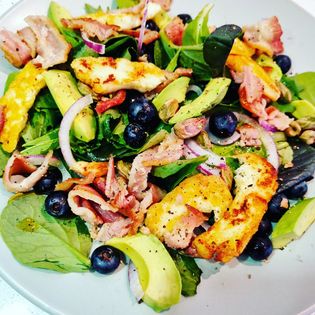 Pistachio, blueberry, bacon and haloumi salad